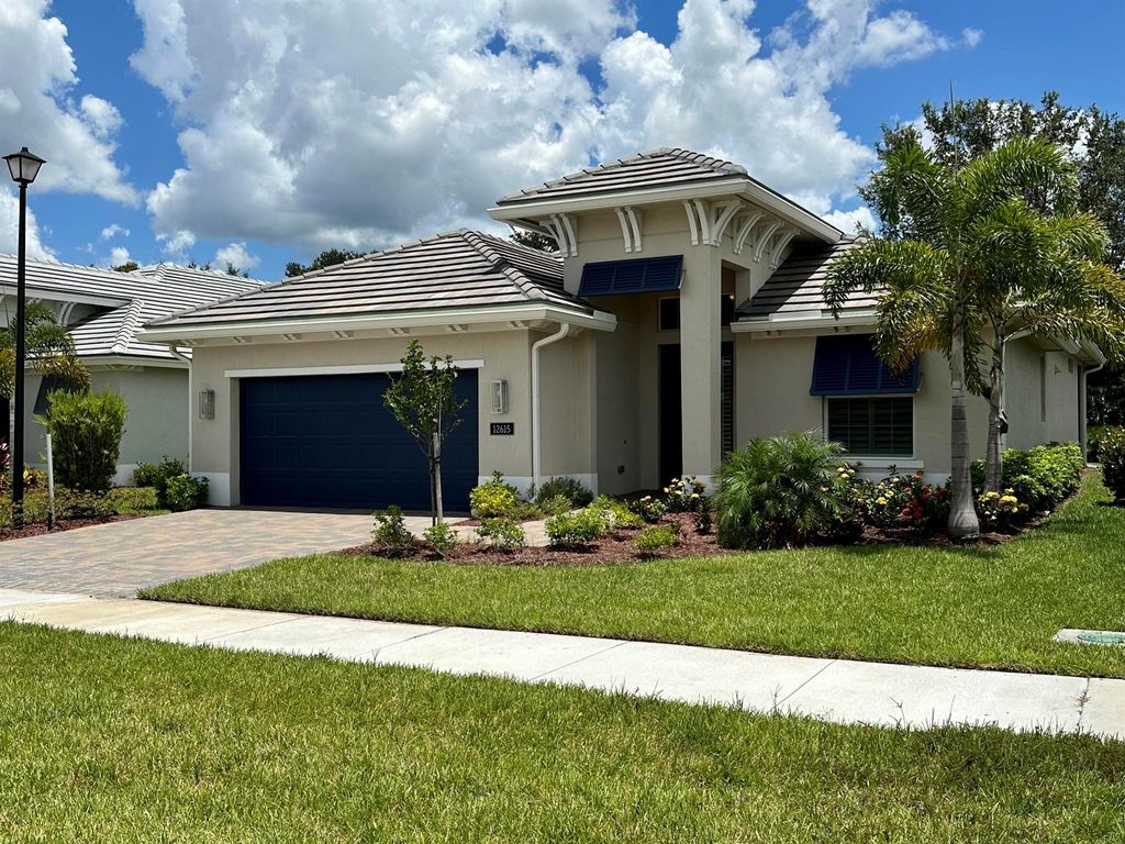 Photo of 12615 SW Sunrise Lake Terrace, Port St Lucie, FL 34987 (MLS # R10901523)