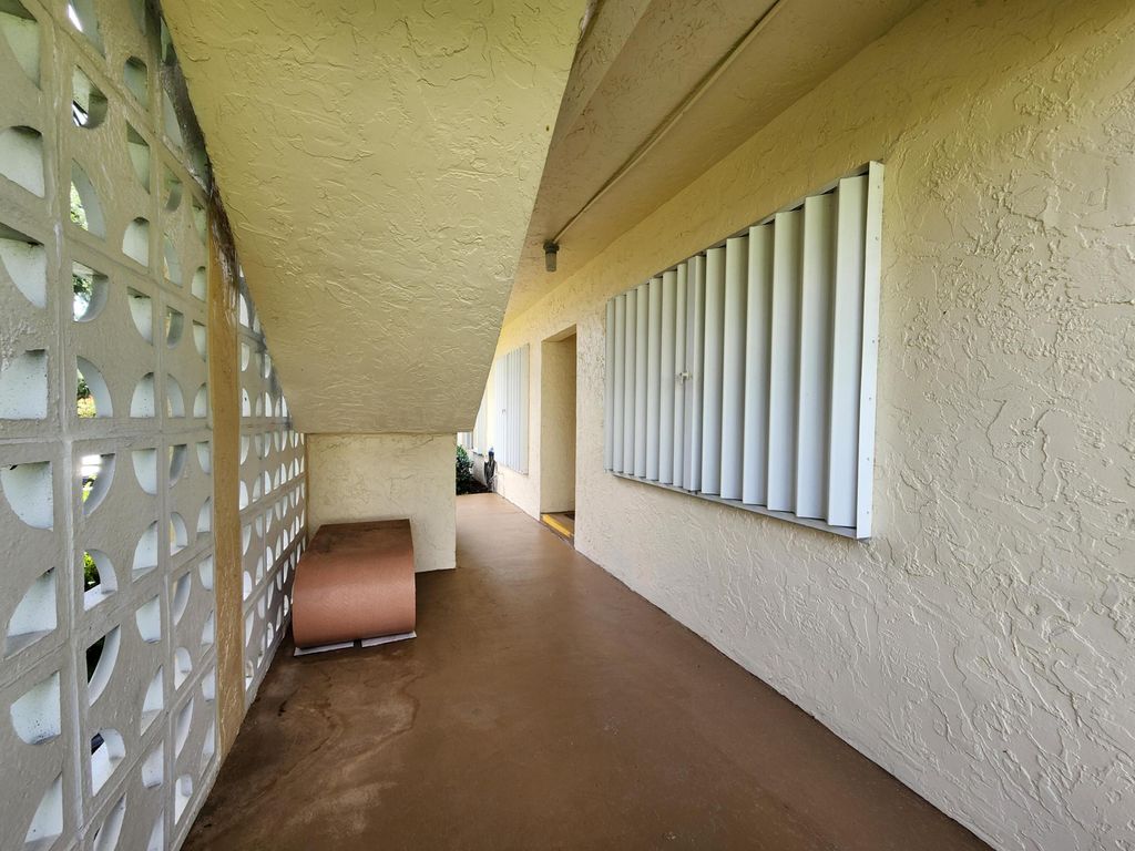 Photo of 1560 NW 18th Avenue, Delray Beach, FL 33445 (MLS # B26032325)
