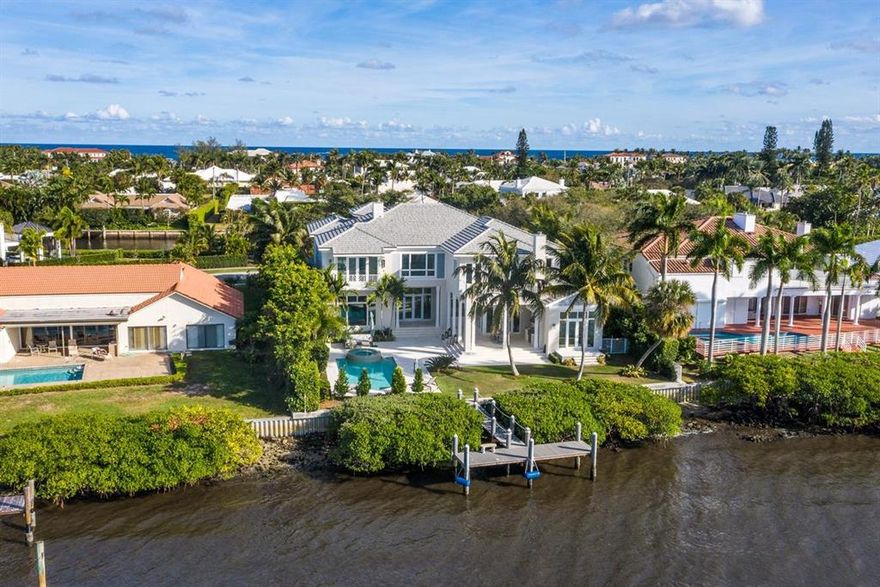 Enjoy this spectacular & secluded waterfront home on  Point Manalapan! This  7,800 sq. ft. 2 story,  6 bedroom, 7.5 baths home offers you the best of South Florida waterfront living. Located in a very exclusive area this home features sensational sunsets and incredible views across your waterfront dock and new seawall located in the wide section of the Intracoastal Waterway. The deep water dock is nestled in the tranquil Intracoastal waters surrounding the Point and can accommodate up to a 25' boat and provides an easy and relaxing short ride to the open ocean. The grand two story entrance foyer sets the stage and welcomes you to an open floor plan bathed in warm natural light.