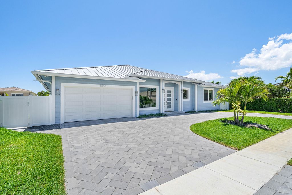 Photo of 830 NE 72nd Street, Boca Raton, FL 33487 (MLS # B26027310)