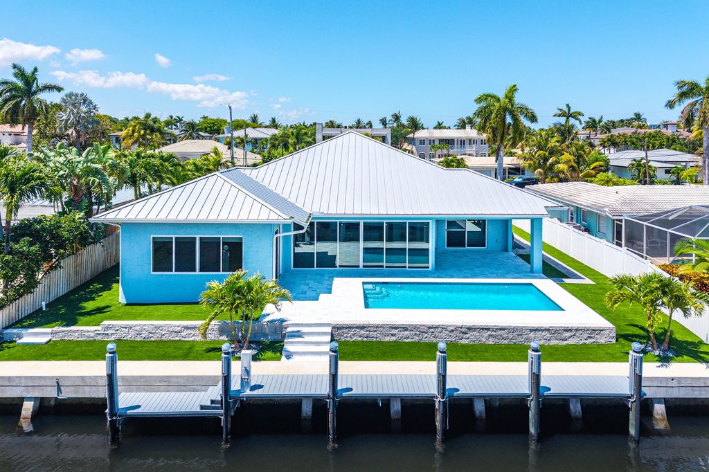 Photo of 830 NE 72nd Street, Boca Raton, FL 33487 (MLS # B26027310)