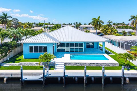 Photo of 830 NE 72nd Street, Boca Raton, FL 33487 (MLS # B26027310)