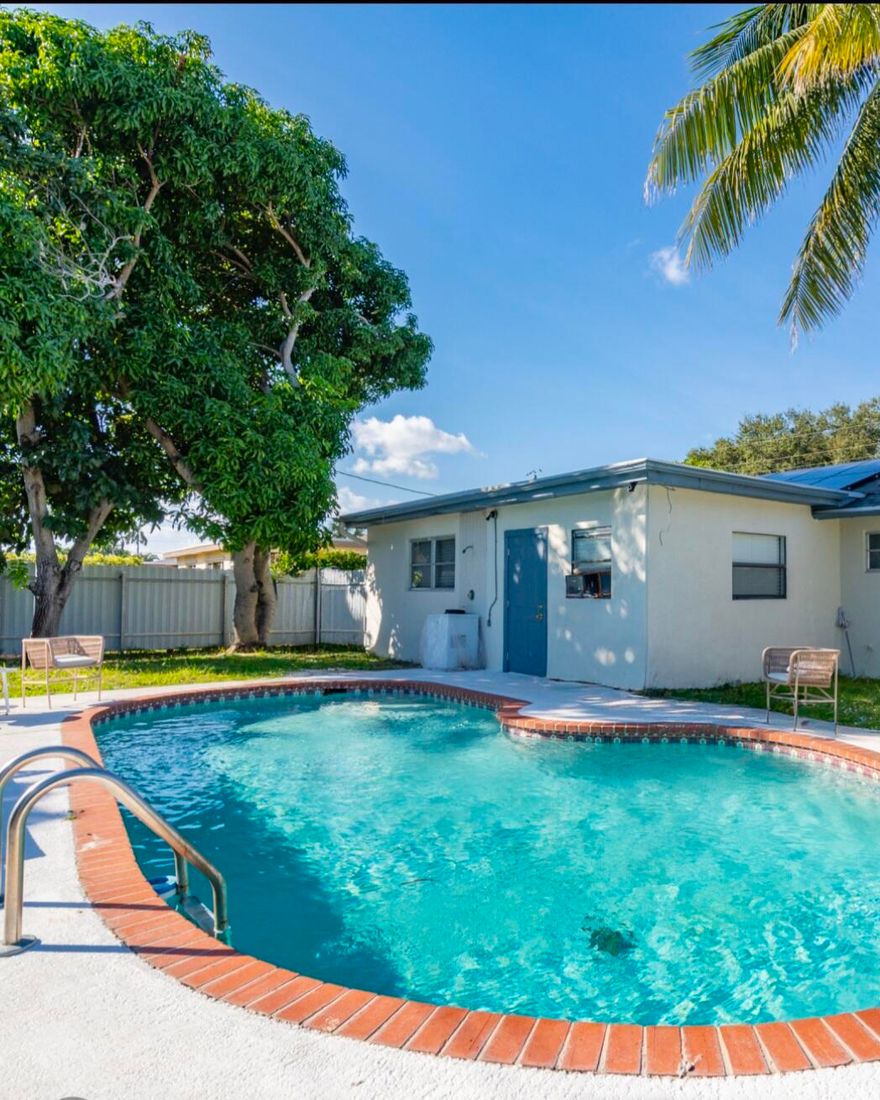 Welcome to your dream home in Boynton Beach, Florida! This beautiful 4-bedroom, 2-bath single-family home, conveniently located just west of I-95 in a highly desirable community, offers comfort, style, and exceptional value. Step outside and enjoy your own private oasis featuring a large swimming pool and spacious backyard, ideal for entertaining family and friends or simply relaxing in the Florida sunshine. The home also features solar panels to keep energy costs low, and the solar balance will be fully paid at closing, providing a valuable benefit for the new owner.