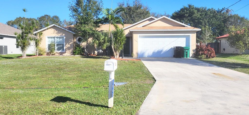 Photo of 1943 SW Americana Street, Port Saint Lucie, FL 34953 (MLS # R10943179)