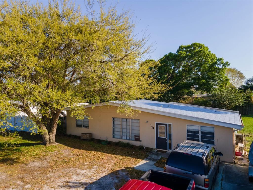 Photo of 144 SE Prima Vista Boulevard, Port Saint Lucie, FL 34983 (MLS # R10695423)