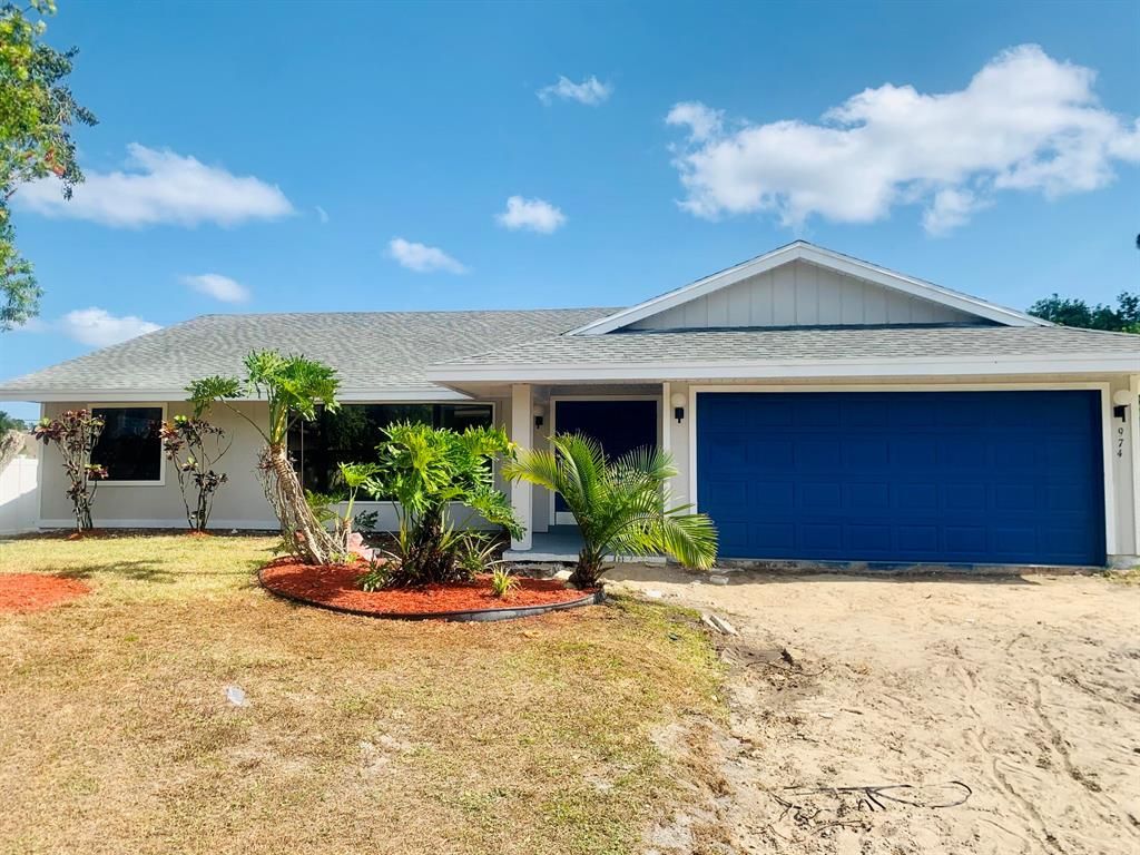 Photo of 974 SE Belfast Avenue, Port Saint Lucie, FL 34984 (MLS # R10718461)