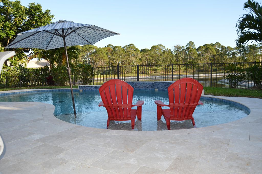 Photo of 6110 SE Split Oak Trail, Hobe Sound, FL 33455 (MLS # R10782332)