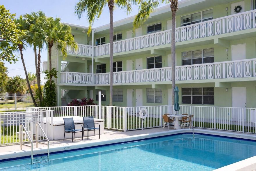 Bright and airy 2 bed / 2 bath corner unit ideally located in the heart of Victoria Park. This light-filled residence is just minutes from the beach, Las Olas, and some of Fort Lauderdale’s best dining and entertainment. The updated kitchen features quartz countertops, a new GE refrigerator, and a new range, while the remodeled primary bathroom showcases a modern teakwood vanity for a warm, contemporary feel. The building offers a 2022 roof and new washers and dryers installed in 2024. One assigned parking space plus guest parking included. Enjoy a beautifully landscaped pool area with BBQ grills and lush garden surroundings. Easy to show via ShowingTime.