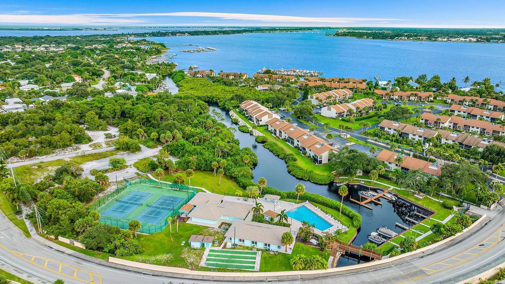 Photo of 1561 NE 12th Terrace #C14, Jensen Beach, FL 34957 (MLS # R11107270)