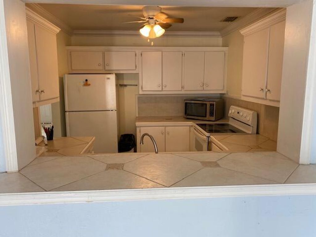 Photo of 6884 Florida Drive, Lake Worth, FL 33462 (MLS # R10971135)