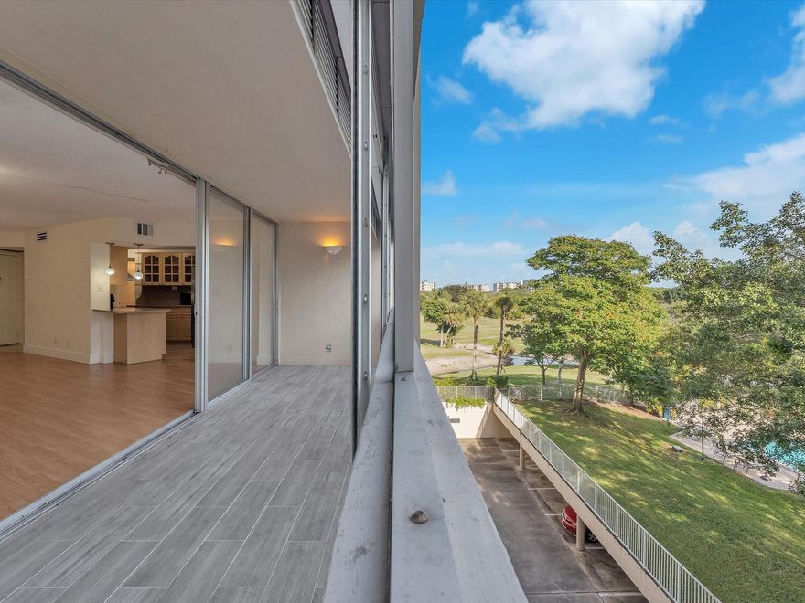 Welcome to this bright and spacious condo in a secure, gated community offering amazing resort-style amenities! Step inside to an open floor plan wood laminate flooring throughout tile kitchen perfect for everyday living. Relax on your large private balcony overlooking garden pool views. The primary bedroom features walk-in closet, providing plenty of storage space. Enjoy everything this community has to offer — a sparkling pool, fitness center, clubhouse, tennis courts, and more. Emotional support animals welcomed. Water, sewer, garbage, basic cable and internet . Minimum credit score 670 . All of this just minutes from top shopping, dining, and easy highway access !