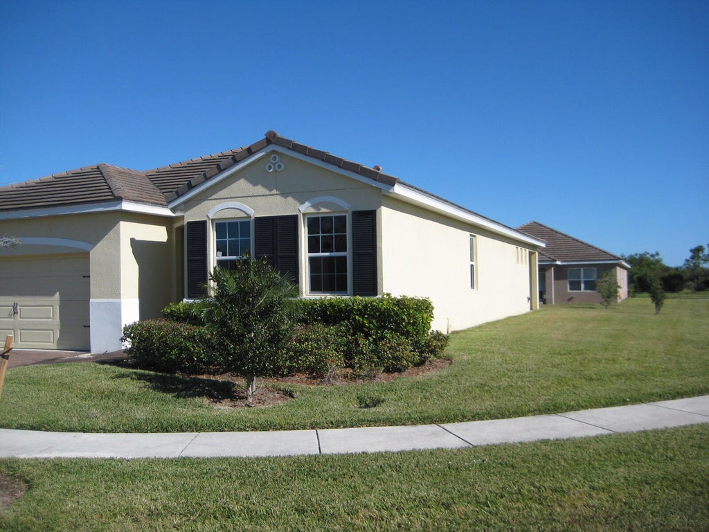 Photo of 10605 SW Jem Street, Port Saint Lucie, FL 34987 (MLS # R11043053)