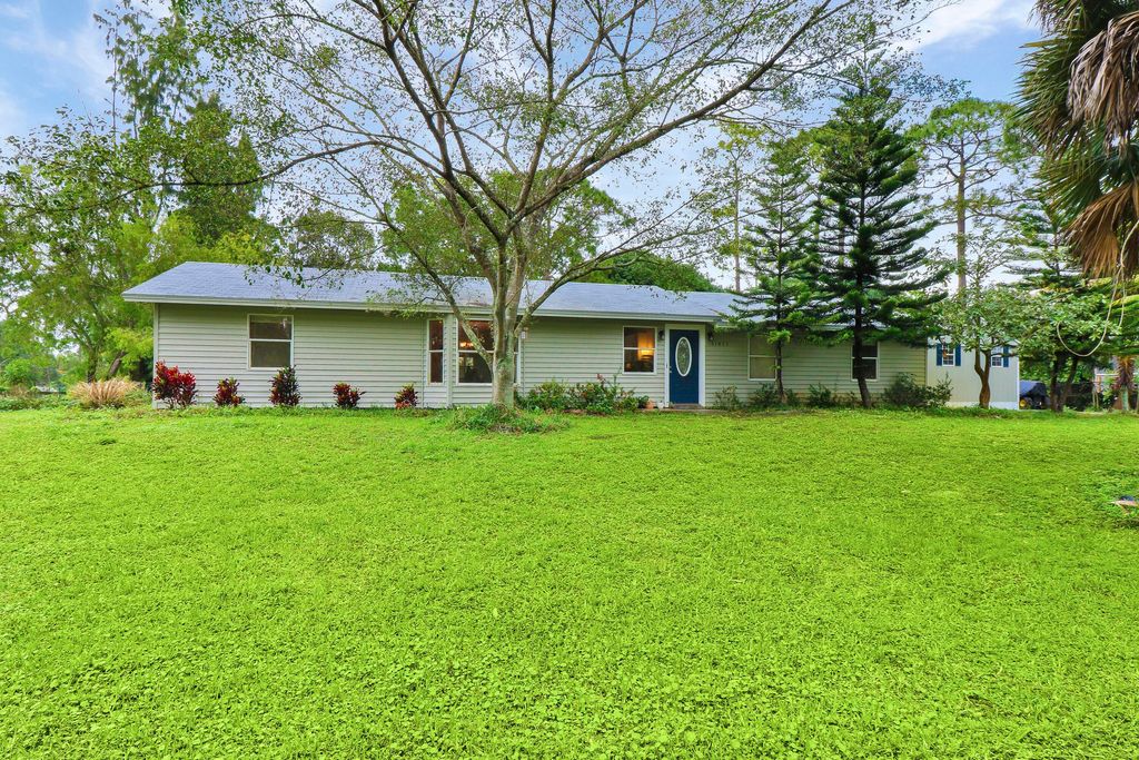 Photo of 11821 62nd Lane N, West Palm Beach, FL 33412 (MLS # R10953803)