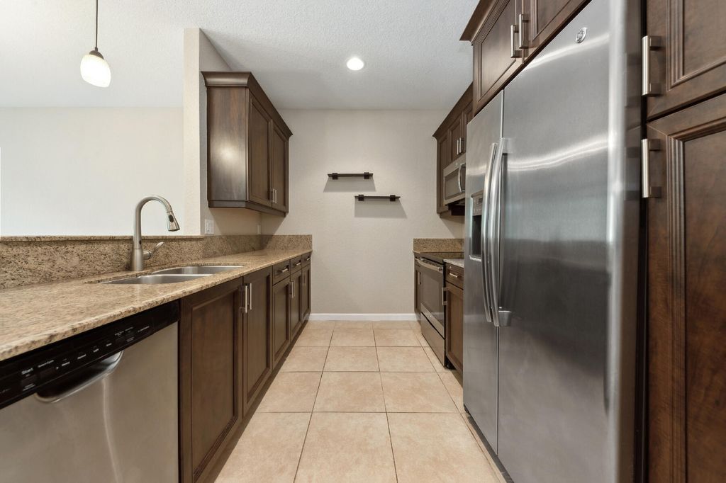 Photo of 5911 Monterra Club Drive, Lake Worth, FL 33463 (MLS # R11094526)