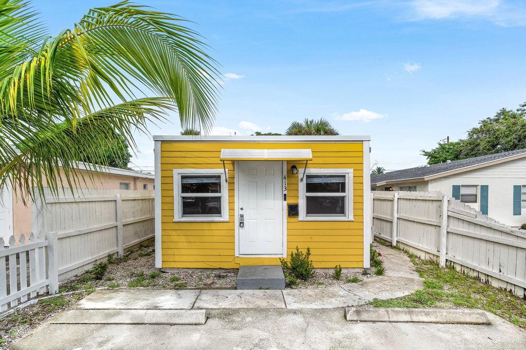 Photo of 413 N E Street, Lake Worth Beach, FL 33460 (MLS # B26080411)