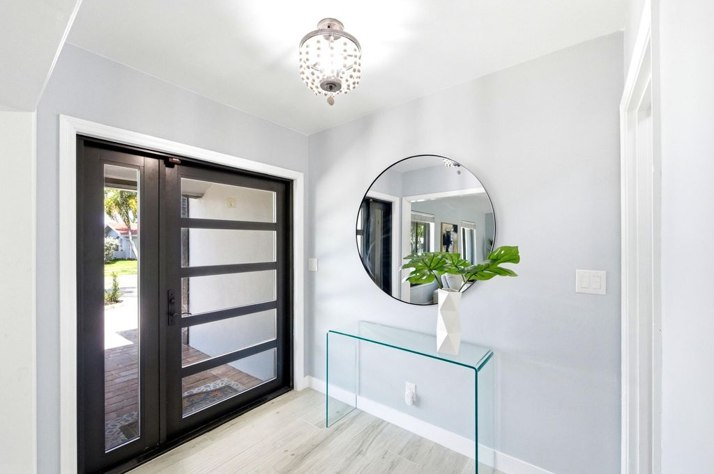 Photo of 6600 NE 21st Terrace, Fort Lauderdale, FL 33308 (MLS # B26027386)