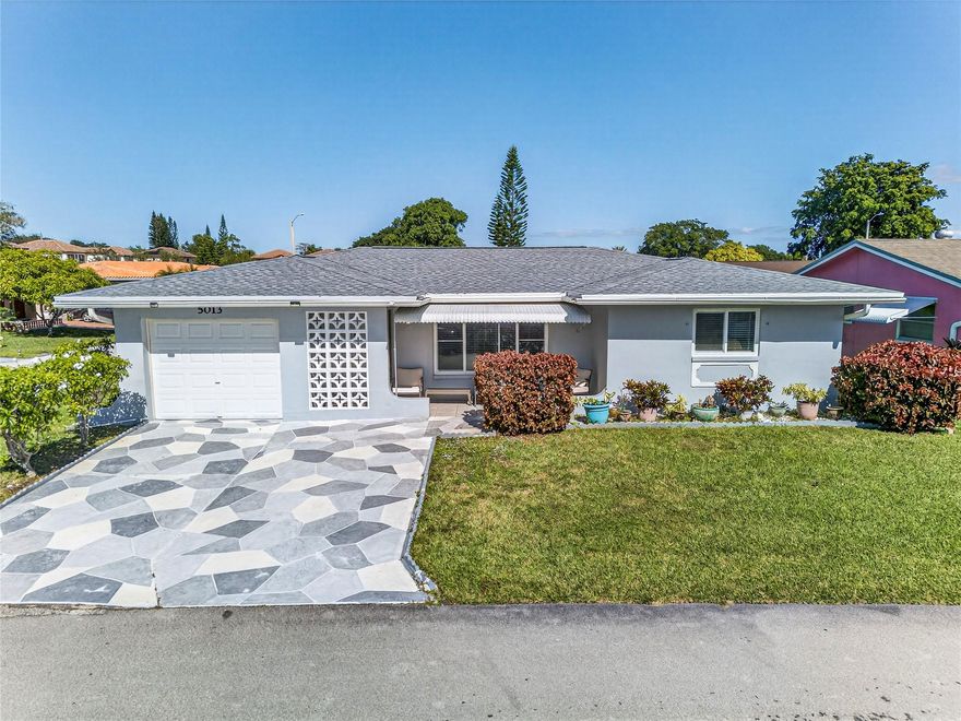 Beautiful turn-key renovated home in Tamarac with major updates throughout. Enjoy peace of mind with a new roof, updated plumbing, and partial impact windows. Inside features a bright, open layout with modern finishes, new flooring, and a fully updated kitchen with brand-new appliances. Spacious bedrooms and refreshed bathrooms offer comfortable living. Move-in ready with nothing left to do, this home is perfect for buyers seeking quality, style, and convenience in a great location.