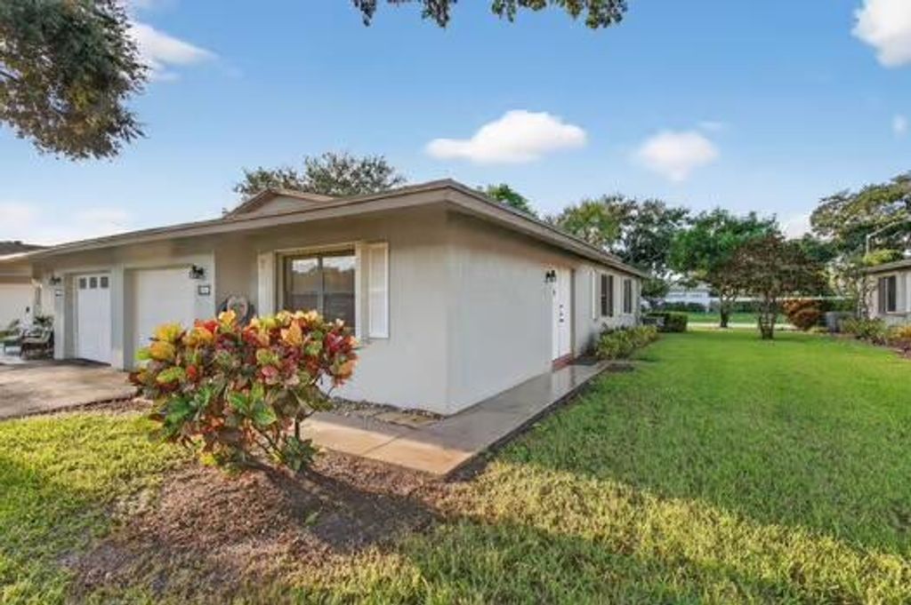 Photo of 1570 Palmland Drive, Boynton Beach, FL 33436 (MLS # R11125560)