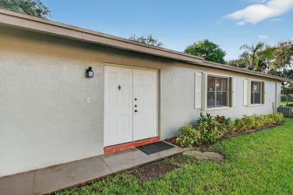 Photo of 1570 Palmland Drive, Boynton Beach, FL 33436 (MLS # R11125560)