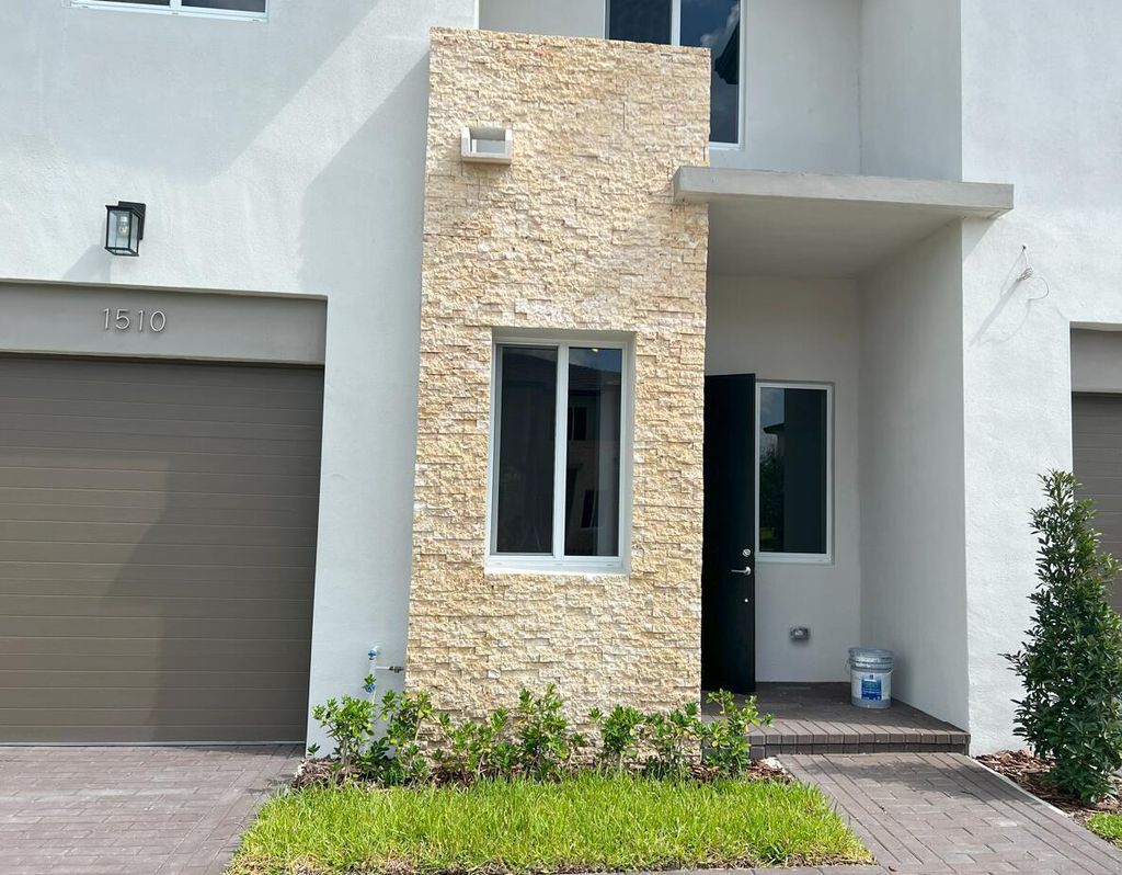Photo of 1510 Pioneer Way, Royal Palm Beach, FL 33411 (MLS # R11120532)