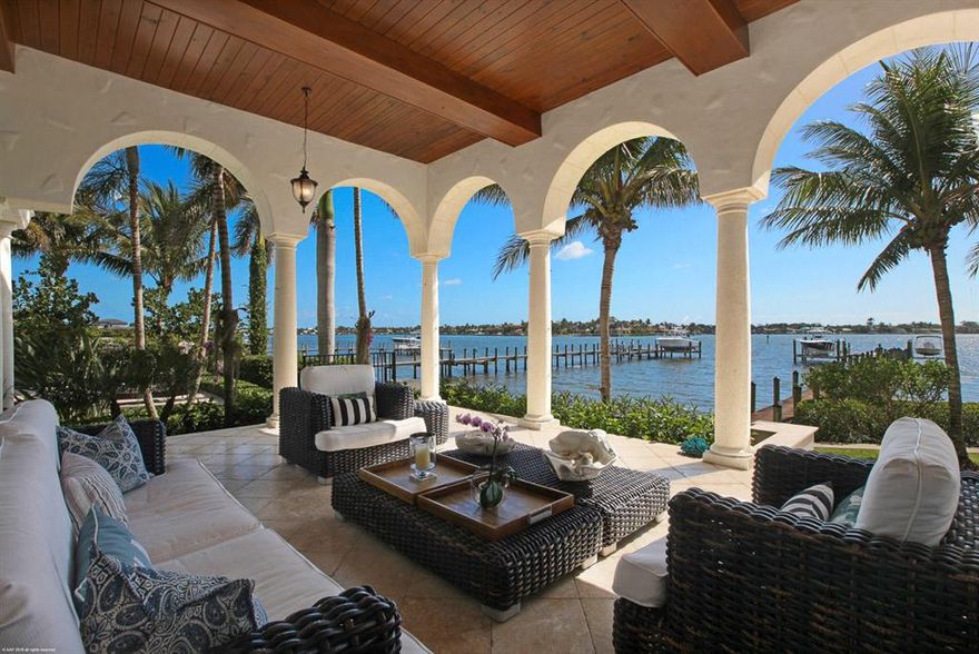 This spectacular Riverfront Estate offers wide panoramic views of the Loxahatchee River & Jupiter lighthouse. Built in 2009, it offers outstanding finishes throughout the 9,500 s.f. living area which was designed by Britto Charette, this house comes with all the luxuries you would expect and offers resort style living. Sweeping wide Loxahatchee river views, 6 generous bedrooms, 8.5 bath, elevator, first and second floor laundry rooms, wine cellar, guest house, 3 car garage, bonus rooms, complete butler's pantry, dining room, chef's kitchen, gated entry, dock with two boat lifts and much more!  Conveniently located just minutes from the Jupiter Inlet and an hour and a half from the Bahamas by boat. It doesn't get much better than this! Furniture negotiable.