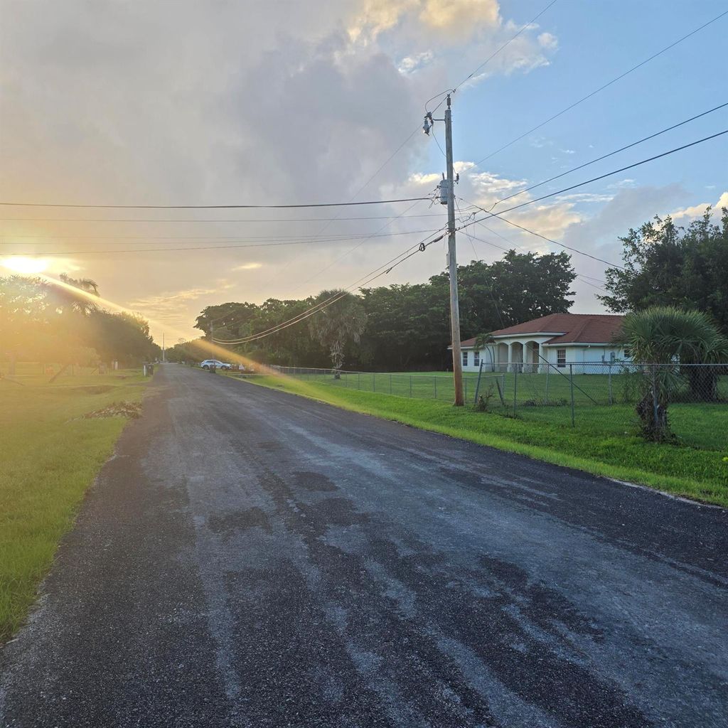 Photo of 16244 E Grand National Drive, Loxahatchee, FL 33470 (MLS # R11129759)