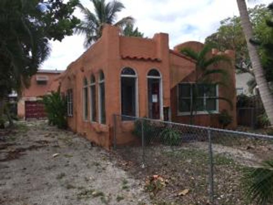 Fantastic opportunity to renovate or tear down and build new in historic district! Main house is 2 bedrooms 1 bath, with 2 bedroom 1 bath apartment above garage! House needs to be completely redone, but tons of opportunity! If interested, please drive by first and look through windows and then call or email to schedule a visit.