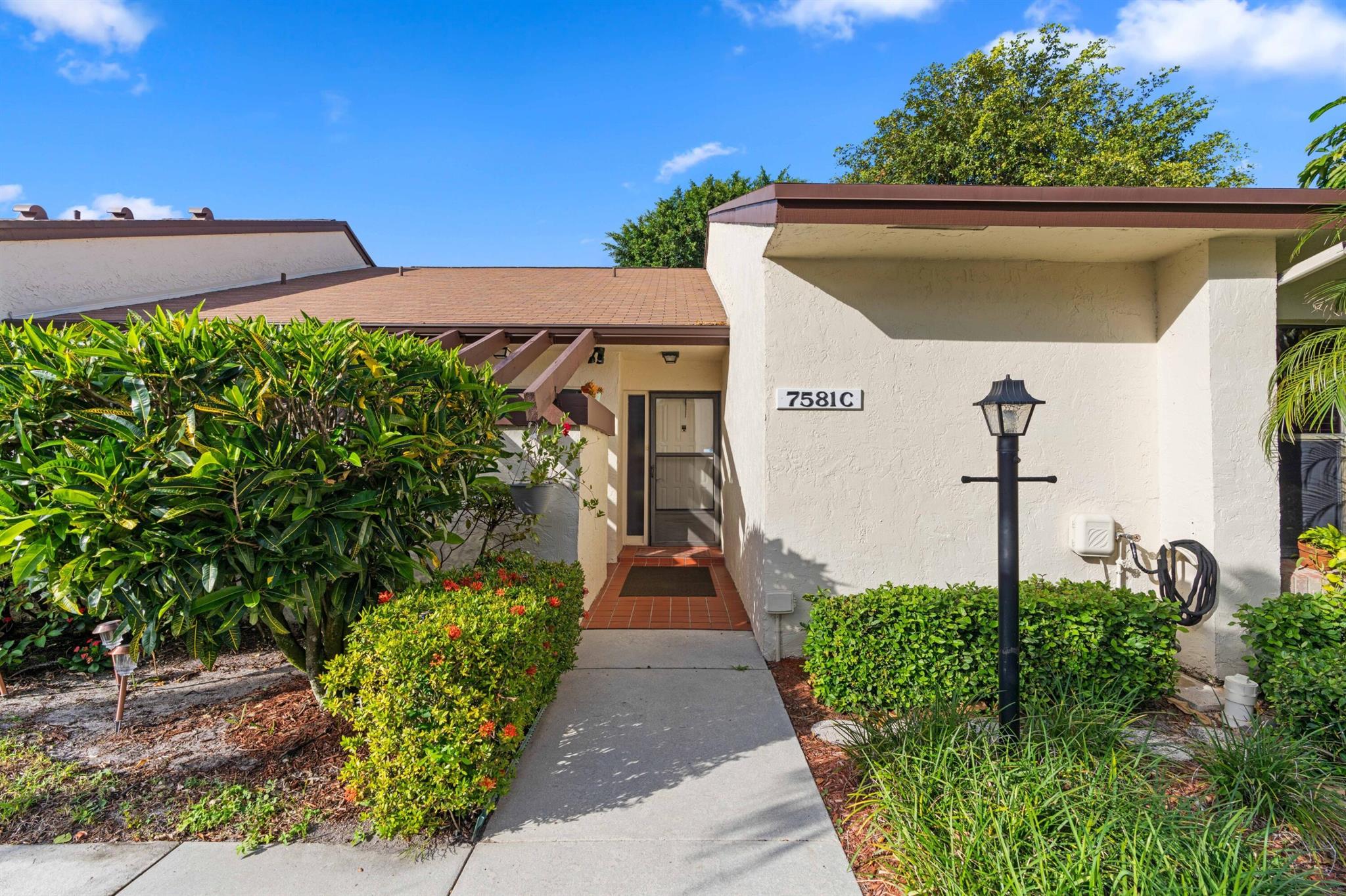 Welcome to your serene South Florida retreat! This meticulously maintained 2-bedroom, 2-bath villa is located in the highly sought-after 55+ community of Willow Bend, offering the perfect blend of comfort, convenience, and active lifestyle living. Inside you will find a bright and spacious open floor plan, featuring modern updates throughout. Both bedrooms offer generous closet space and natural light, creating a warm and welcoming atmosphere. Enjoy the ease of first-level living with convenient parking right out front. This villa offers seamless indoor/outdoor living with two seperate patios. Just a short distance from the community's amenities including a pool, fitness center, clubhouse, and tennis courts. You will not find something more move in READY!