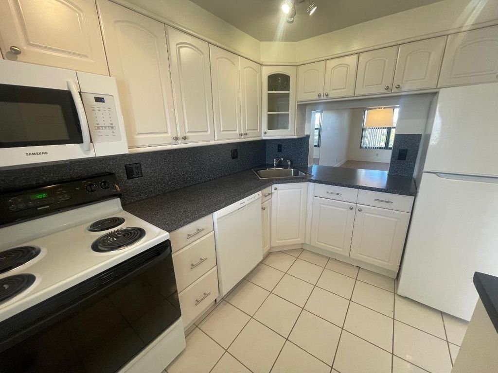 Photo of 2311 S Cypress Bend Drive #417, Pompano Beach, FL 33069 (MLS # F10467685)