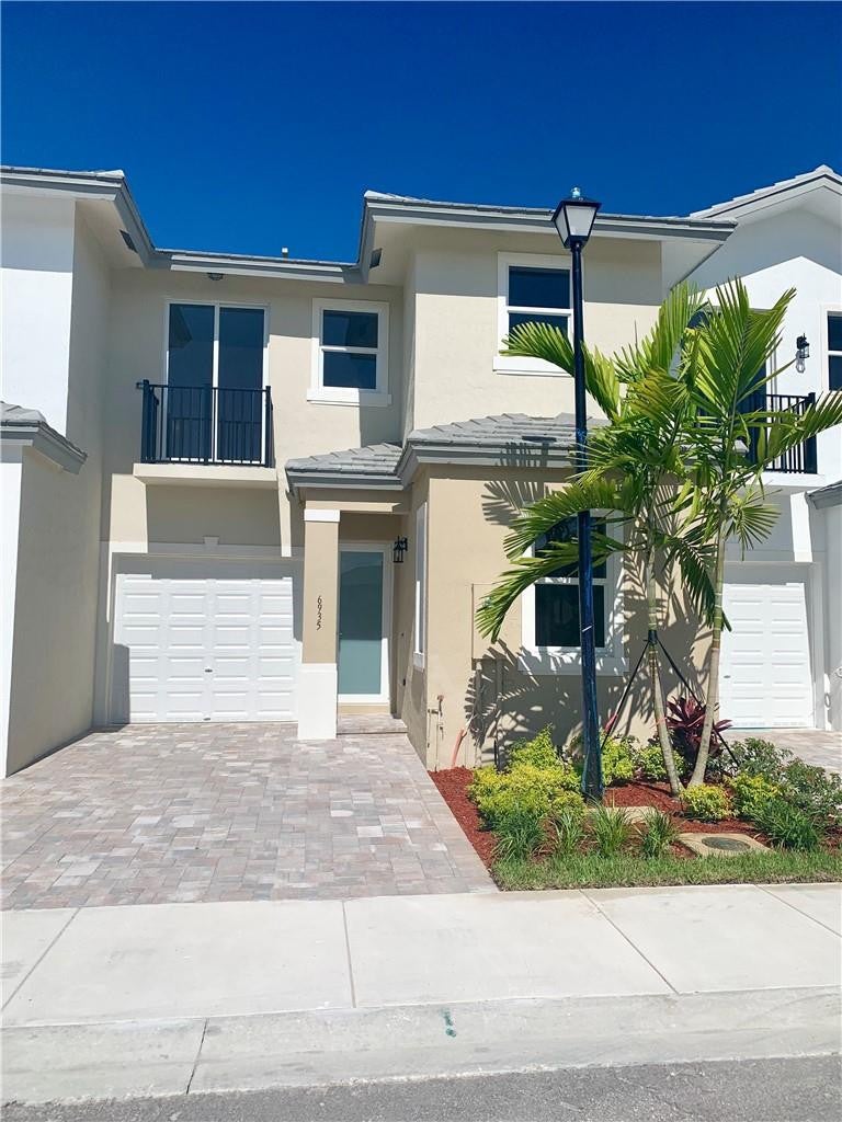 Photo of 6935 PINES Circle #16, Coconut Creek, FL 33073 (MLS # B26085983)
