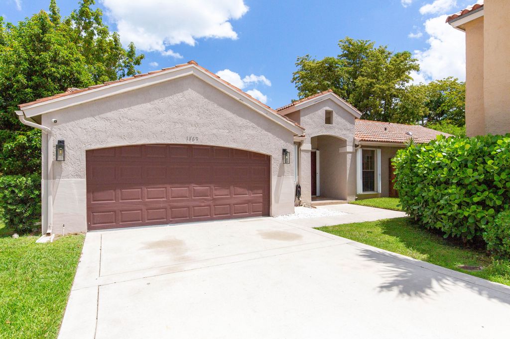 Photo of 1769 Harborside Circle, Wellington, FL 33414 (MLS # B26023463)