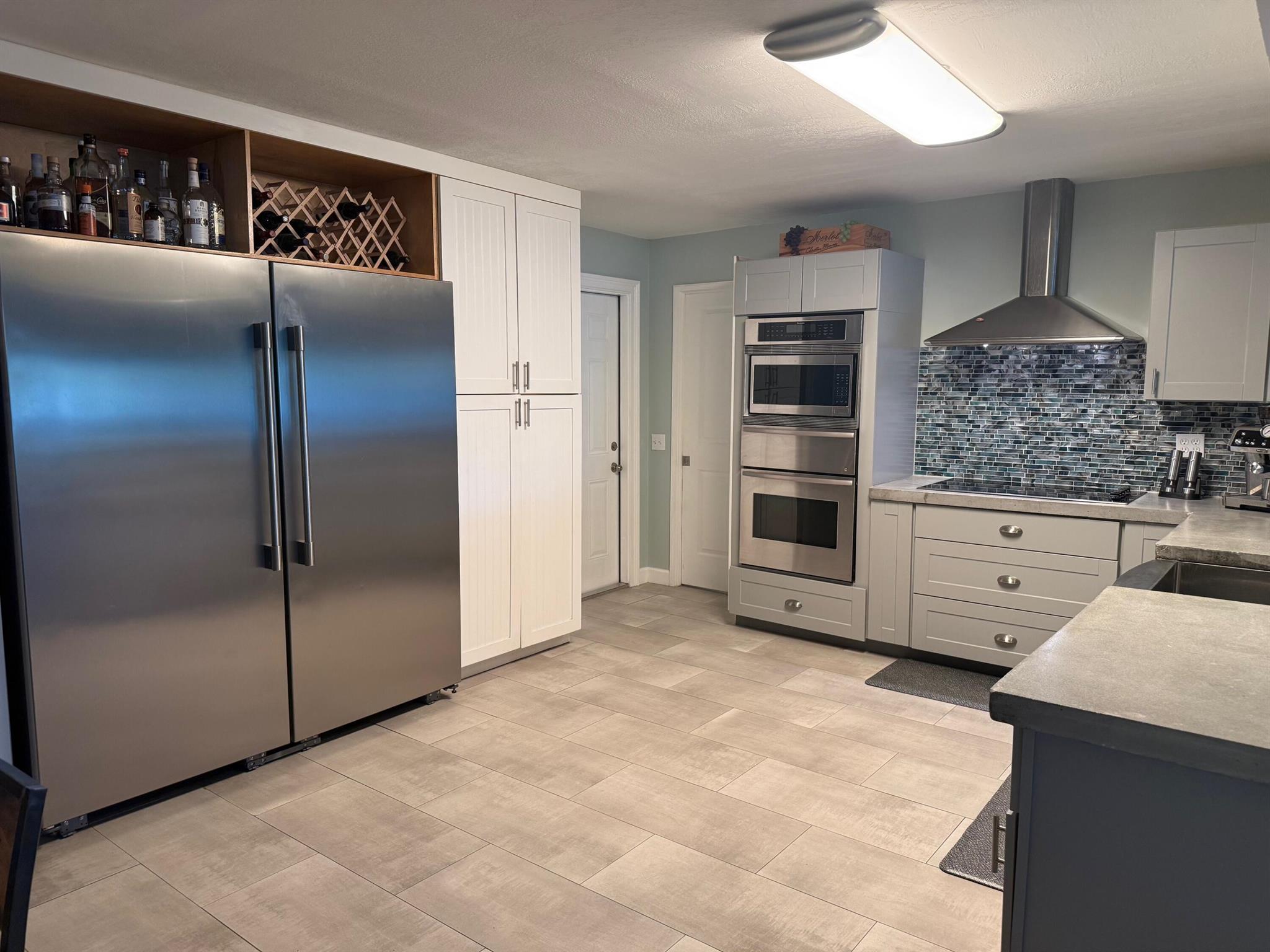 Palm Beach County's best-kept secret: Island Estates. One-of-a-kind lifestyle, designed home situated on the very sought-after Lake Osborne. This hidden gem with a direct lake view and private dock will not last. Beautiful yard with room for a pool overlooking the amazing LakeOsborne. $10.00 HOA fee annually (Voluntary).