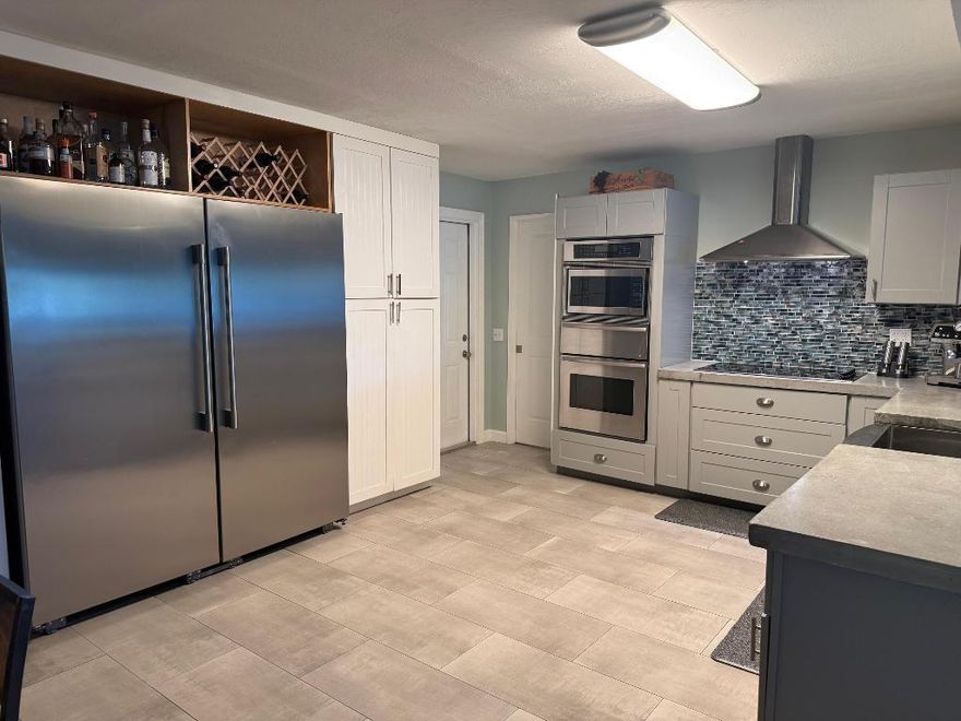 Palm Beach County's best-kept secret: Island Estates. One-of-a-kind lifestyle, designed home situated on the very sought-after Lake Osborne. This hidden gem with a direct lake view and private dock will not last. Beautiful yard with room for a pool overlooking the amazing Lake
Osborne. $10.00 HOA fee annually (Voluntary).