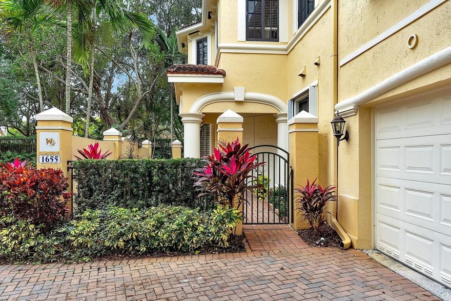 Mariposa Point, located in the heart of Weston, offers a tranquil living experience. This home features 3 bedrooms, 2 bathrooms, and a 2-car garage within a secure, walled enclave. Currently the 3rd bedroom is being used as a formal dining room that can easily be converted back to a den or bedroom. Enjoy the added privacy of a personal courtyard and a screened outdoor living room. The residence boasts wood floors, newly renovated kitchen, updated bathrooms, and a convenient laundry area. Situated in a meticulously maintained community, Mariposa Point is just minutes away from Weston Hills Country Club and within walking distance to Town Center.