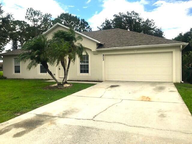 Photo of 513 SW ESTER Avenue, Port Saint Lucie, FL 34983 (MLS # B26095010)