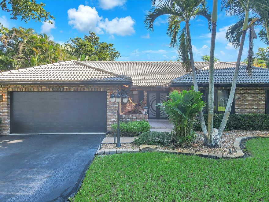 This tropical oasis features newly resurfaced salt water pool, tiki bar & hot tub on an expansive lot! Stunning 4/2 home is a haven of tranquility and entertainment. Inside you will see a thoughtful split floor plan, providing privacy and functionality. The living spaces are adorned with hurricane impact windows and doors allowing tons of natural light to illuminate the interior. The kitchen is equipped w SS appliances and an inviting breakfast nook. Master suite is a sanctuary, boasting desirable his and hers large closets. Generous sized rooms. Located in a highly sought-after neighborhood w excellent schools and parks nearby, ideal for families. New water heater placed in 2022 and new AC unit in 2020. Special features: water softening system, mosquito misting system and alarm system.