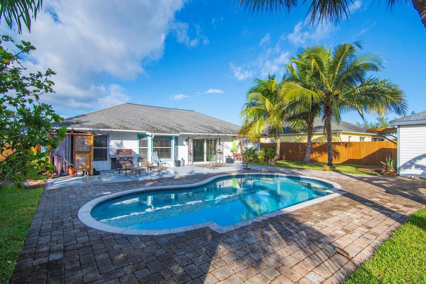 WELCOME HOME to this lovely 3-bedroom, 2-bath pool home is perfectly located just steps from Downtown Fort Pierce, A1A, and the beautiful Fort Pierce Beach. With no HOA, you can bring your family, pets, and live your best Florida life near the surf! This is a great investment opportunity--ideal for Airbnb or short-term rental potential. Your piece of paradise awaits!
