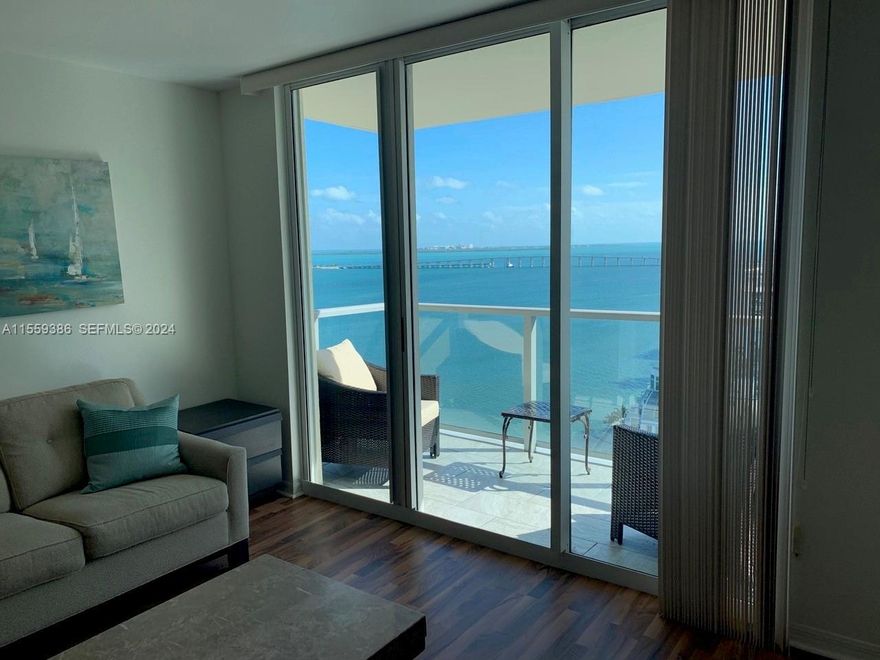 Enjoy breathtaking views from this spacious 22nd-floor one-bedroom unit at The Mark on Brickell. Fully furnished, open floor plan, washer & dryer in the unit.  This move-in-ready unit is in a premier, family-friendly building in Miami's financial district offering resort-style amenities: waterfront pool and jacuzzi, state-of-the-art fitness center, spa, sauna, tennis and racquetball courts, business center, clubroom, convenience store, 24-hour security, and a renowned bayfront restaurant. One assigned parking space. 24-hour notice for showing.