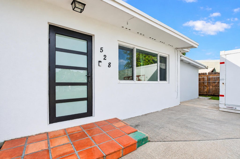 Photo of 528 BEECH Road, West Palm Beach, FL 33409 (MLS # B26093589)