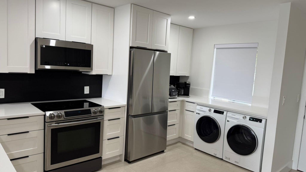 Photo of 4539 Luxemburg Court #102, Lake Worth, FL 33467 (MLS # B26045348)
