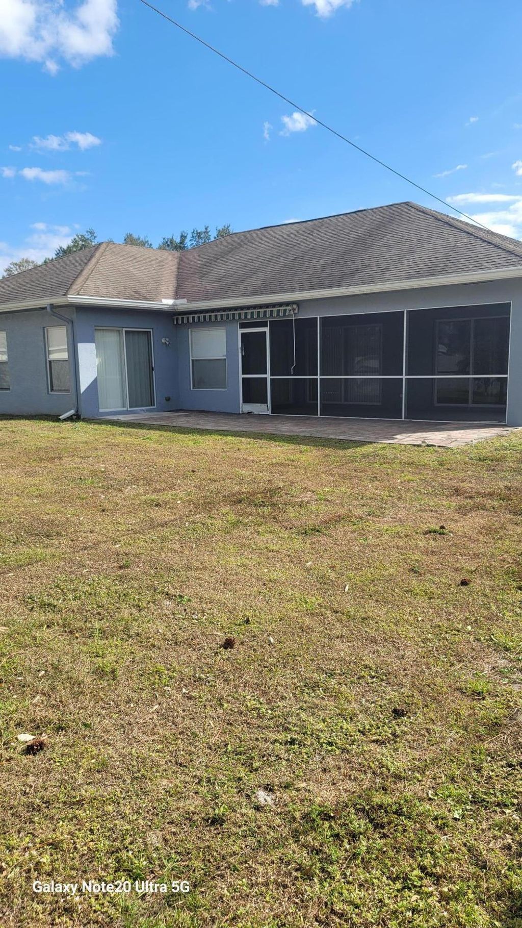Photo of 1211 SW Wellington Avenue, Port Saint Lucie, FL 34953 (MLS # R11156433)