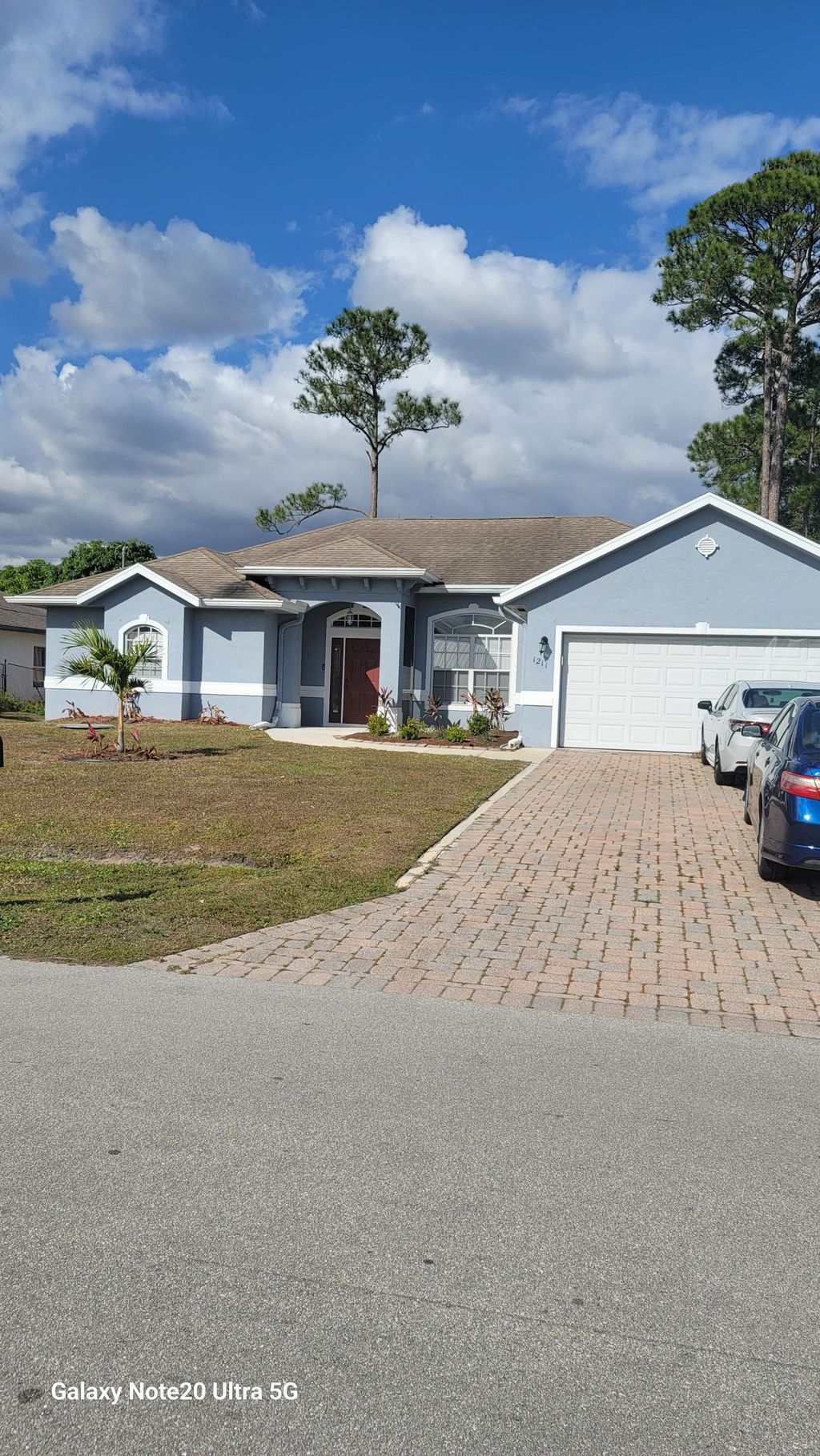 Photo of 1211 SW Wellington Avenue, Port Saint Lucie, FL 34953 (MLS # R11156433)