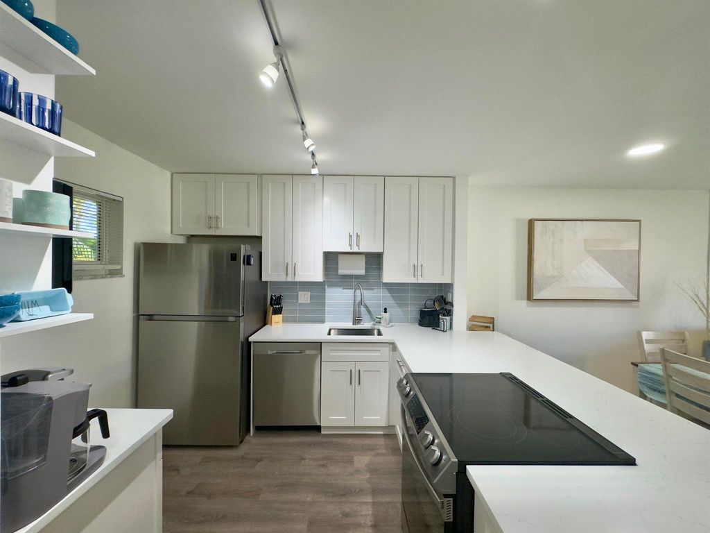 Photo of 2811 S Garden Drive #209, Palm Springs, FL 33461 (MLS # R10992361)