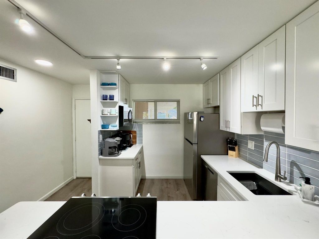 Photo of 2811 S Garden Drive #209, Palm Springs, FL 33461 (MLS # R10992361)
