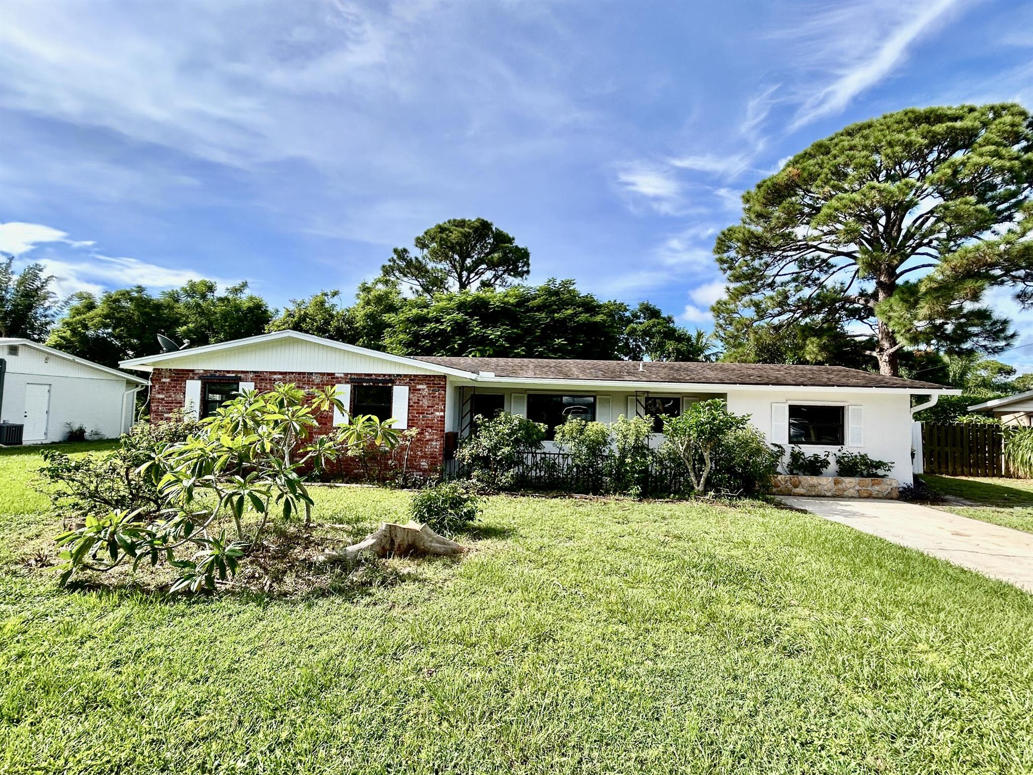 Move In Ready 4 Bedroom Home In The Heart of Stuart. Easy Access To Downtown Stuart and The Beautiful Beaches. Some Of The Many Features Include: Updated Bathrooms W/ Newly Tiled Showers, Updated Vanities, Custom Mirrors and Lighting, New Carpets in Bedrooms, Tile Throughout in Living Areas, Washer & Dryer Included, Fenced In Back Yard w/ Storage Shed, plus Much More. Schedule Your Private Viewing Today. Available For Immediate Occupancy.