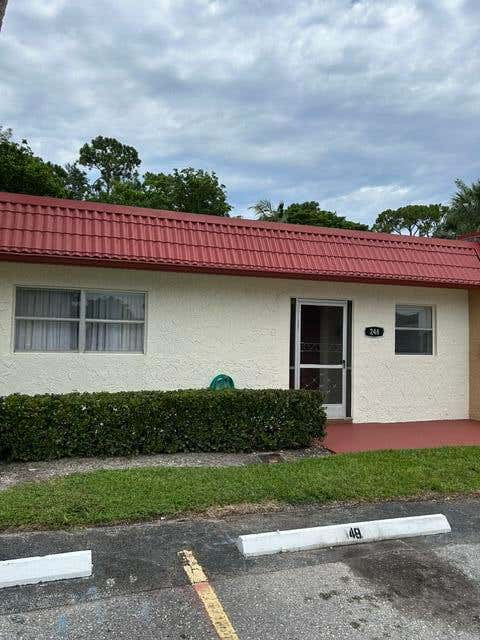 Photo of 248 Lake Dora Drive, West Palm Beach, FL 33411 (MLS # B26058885)