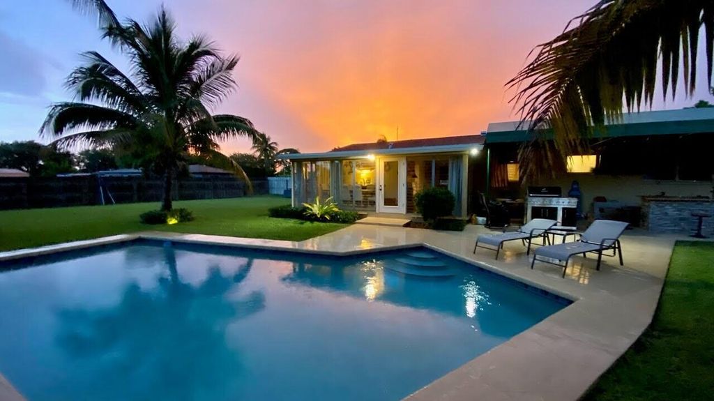 Photo of 430 Crescent Drive, Lake Park, FL 33403 (MLS # R11055140)