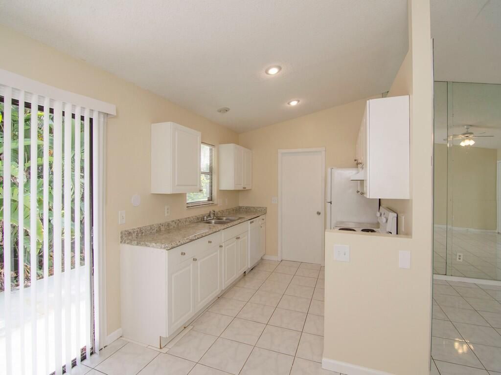 Photo of 291 SW Langfield Avenue, Port Saint Lucie, FL 34984 (MLS # R11000427)