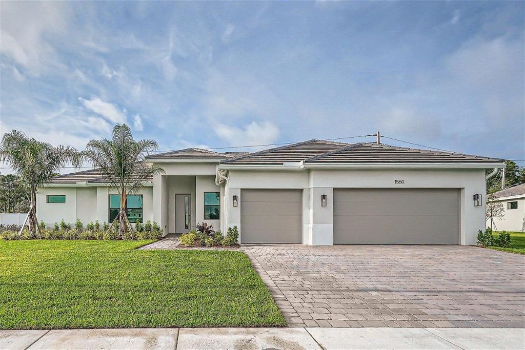 Photo of 1560 Lago Circle, Palm City, FL 34990 (MLS # R10938723)