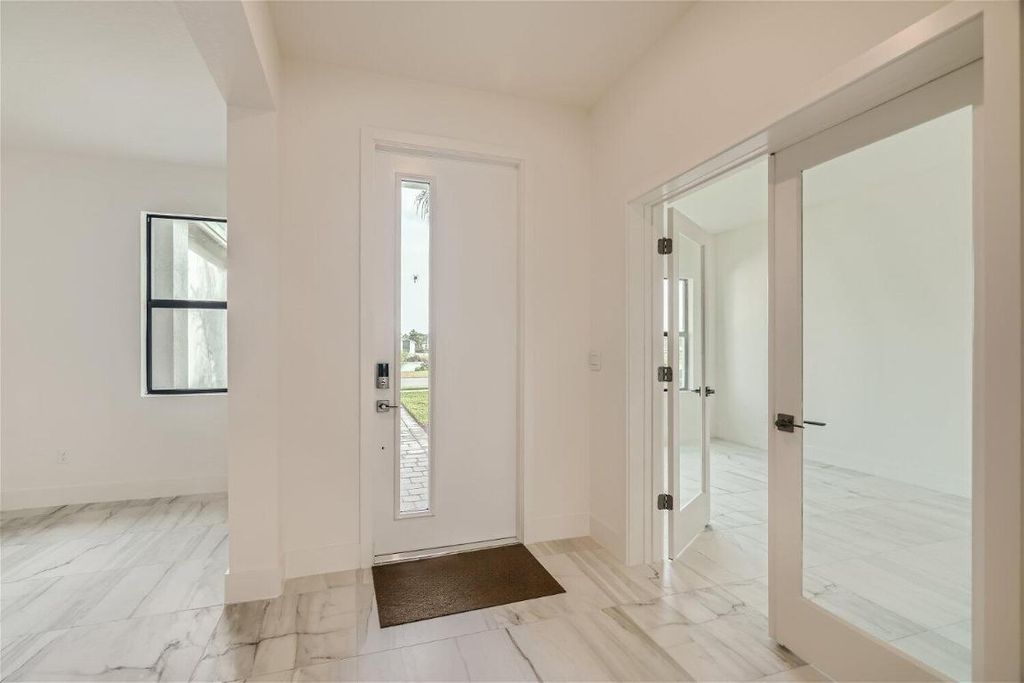 Photo of 1560 Lago Circle, Palm City, FL 34990 (MLS # R10938723)